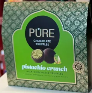 Piena šokolādes trifeles ar kraukšķīgu pistāciju krēma pildījumu 94g PURE