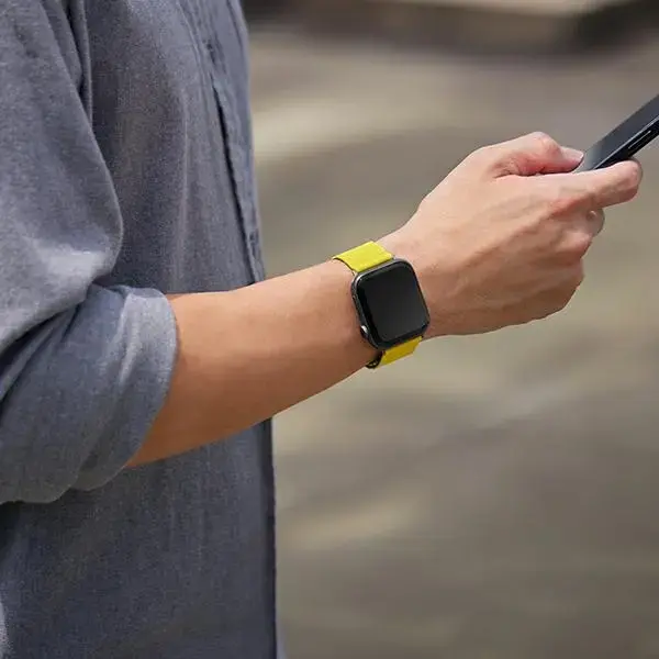 UNIQ viedpulksteņa siksniņa priekš Apple Watch (42/44/45/49 mm) | silikons | dzeltena/pelēka
